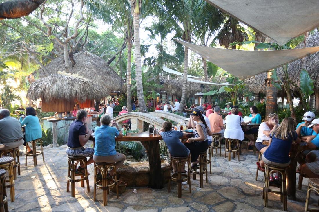 bar crowd at tropical outdoor bar